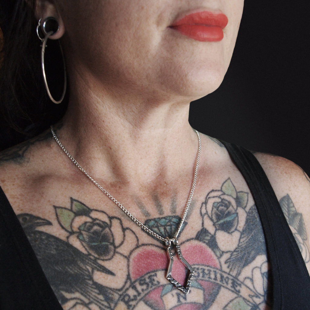 Ring holding necklace